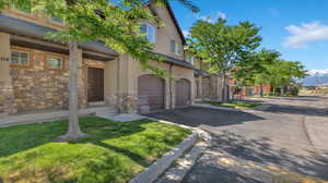 View of front of home featuring a garage