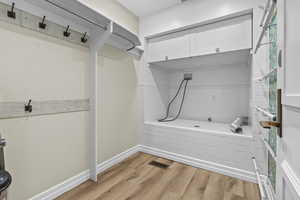 Bathroom featuring wood-type flooring