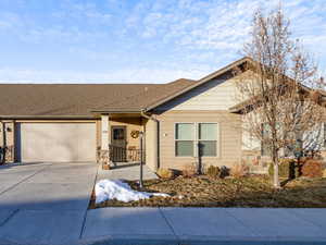 Ranch-style home with a garage