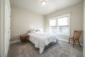 View of carpeted bedroom