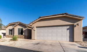 Single story home with a garage