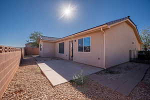 Rear view of house with a patio area