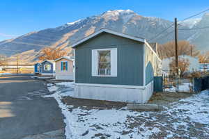 View of front of house with a mountain view