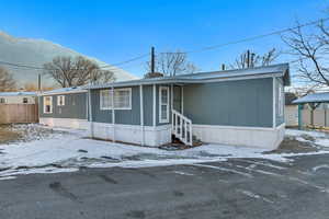 View of front of house featuring a mountain view