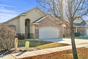 View of front of property with a garage