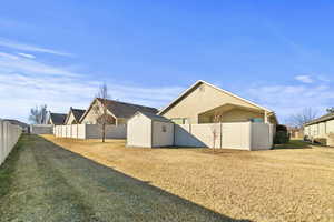 Exterior space featuring a storage shed