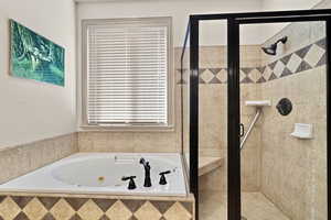 Master Bathroom with shower with separate bathtub