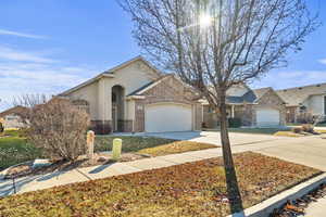 Single story home featuring a garage