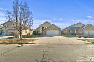 View of front of property with a garage