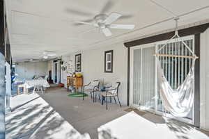 View of patio with ceiling fan