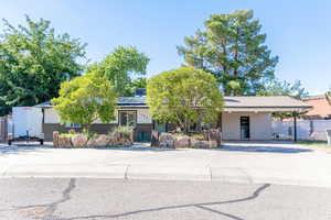 View of front of property with solar panels