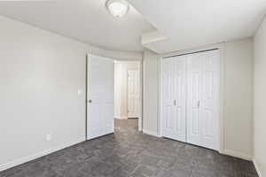 Second basement bedroom with view of large closet.