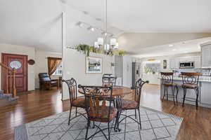 Dining, kitchen and front room view from deck door