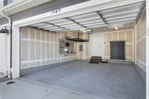 Upgraded garage with epoxy floors and storage racks