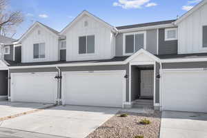 View of front of property featuring a garage