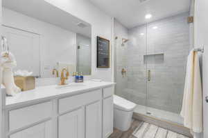 Primary Bathroom with upgraded tile shower, euro glass, and luxury bidet