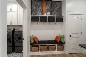 Mudroom with hooks and shelves