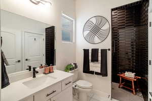 Casita/pool bathroom. Entry from hall and casita