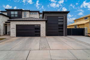 4 car garage and additional side parking