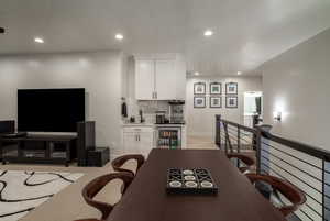 Family room with wet bar area and built in mini fridge