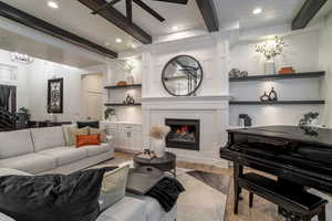 Large entertaining area, fireplace, built in shelving