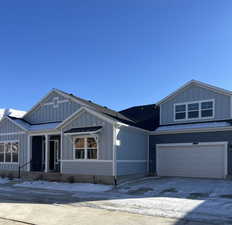 View of front of property featuring an extra spacious 2 car garage