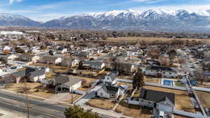 Birds eye view of property featuring a mountain view