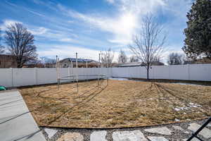 View of yard with a trampoline