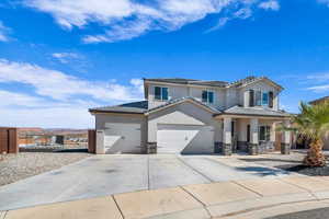 View of front of property featuring a garage