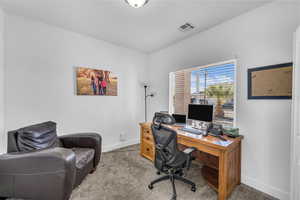 Office area with light carpet