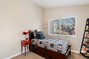 View of carpeted bedroom