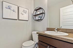 Bathroom with vanity and toilet