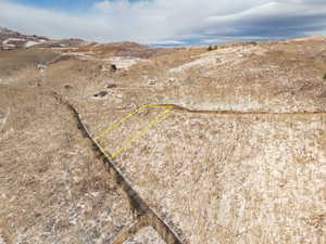 Birds eye view of property with a mountain view