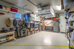 Garage featuring a workshop area