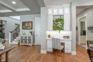 Home office featuring light hardwood / wood-style floors