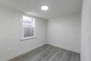 Spare room with light hardwood / wood-style flooring