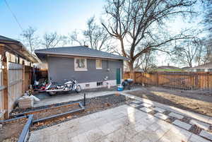 Back of house with a patio area