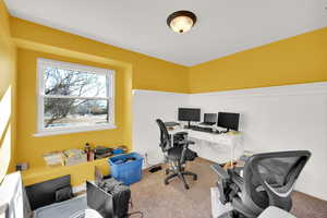 View of carpeted home office