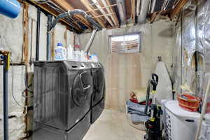 Laundry room with separate washer and dryer