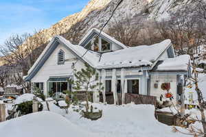 View of front of house with a mountain view