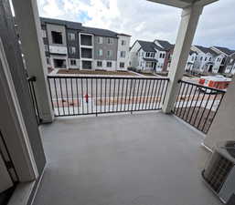 Balcony featuring central air condition unit