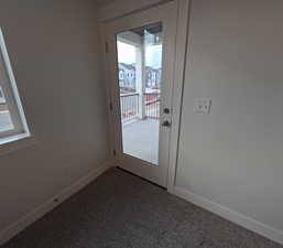 Doorway to balcony with carpet