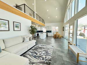 Living room featuring a towering ceiling