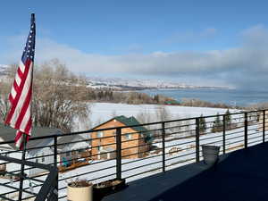 View of deck featuring a water view