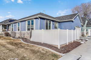 View of side of home's exterior featuring a garage