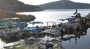 View of dock with a water and mountain view