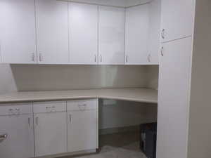 Pantry with Custom Cabinets, Desk, Storage and Bolted Down Safe