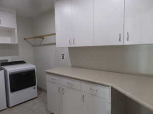 Large Laundry Room/Pantry with Custom Cabinets and Storage