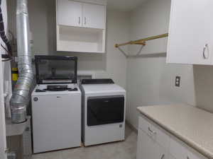 Large Laundry Room/Pantry with Custom Cabinets and Storage