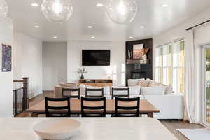 Living room with wood-type flooring